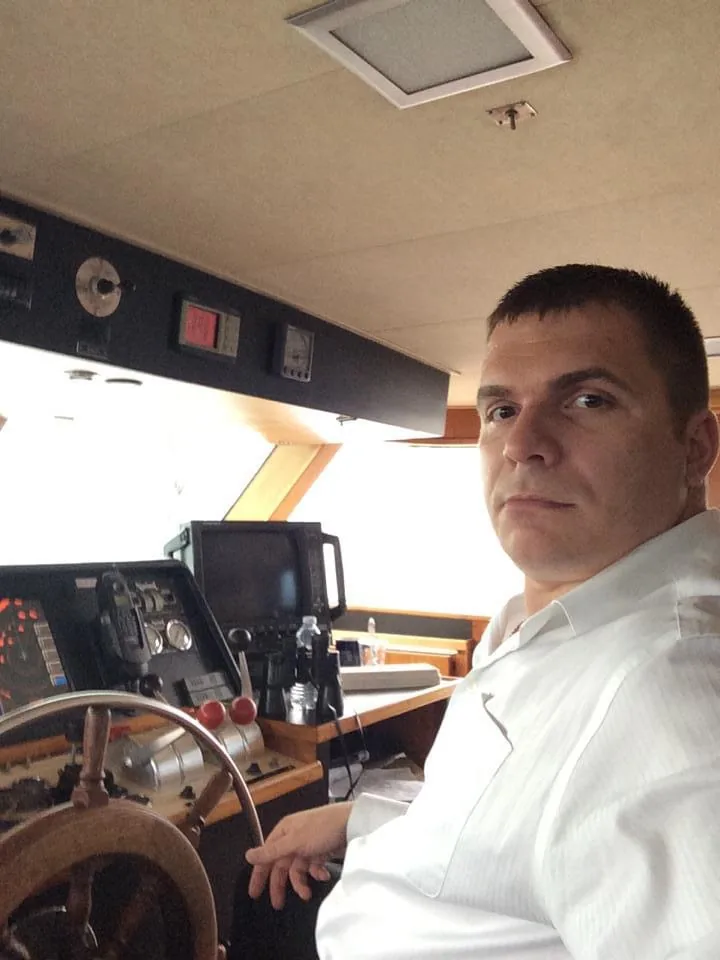 Mechanic and captain at the helm