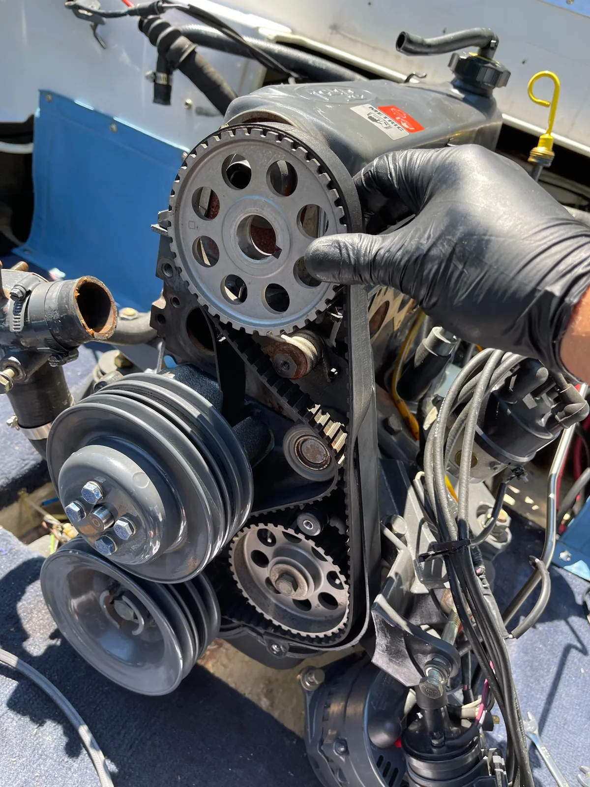 Marine engine timing belt service